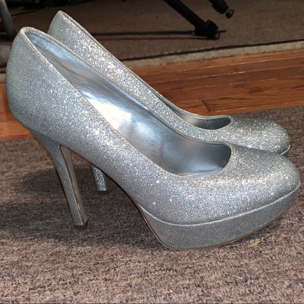 Shiny extra high heels